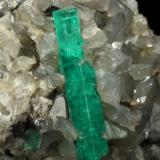 Beryl (variety emerald), Calcite, Dolomite<br />La Pita mining district, Municipio Maripí, Western Emerald Belt, Boyacá Department, Colombia<br />40x43x29mm, xl=22mm<br /> (Author: Fiebre Verde)