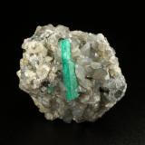 Beryl (variety emerald), Calcite, Dolomite<br />La Pita mining district, Municipio Maripí, Western Emerald Belt, Boyacá Department, Colombia<br />40x43x29mm, xl=22mm<br /> (Author: Fiebre Verde)