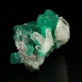 Beryl (variety emerald), Quartz<br />Muzo mining district, Western Emerald Belt, Boyacá Department, Colombia<br />33x24x22mm, xls up to 10mm<br /> (Author: Fiebre Verde)