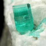 Beryl (variety emerald), Calcite, Pyrite<br />Chivor mining district, El Oriente Mine, Municipio Chivor, Eastern Emerald Belt, Boyacá Department, Colombia<br />59x50x33mm, xl=8mm<br /> (Author: Fiebre Verde)