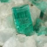 Beryl (variety emerald), Calcite, Pyrite<br />Chivor mining district, El Oriente Mine, Municipio Chivor, Eastern Emerald Belt, Boyacá Department, Colombia<br />59x50x33mm, xl=8mm<br /> (Author: Fiebre Verde)