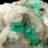 Beryl (variety emerald), Calcite, Dolomite, Pyrite<br />La Pita mining district, Polveros Mine, Municipio Maripí, Western Emerald Belt, Boyacá Department, Colombia<br />52x56x46mm, xls=10 & 5mm<br /> (Author: Fiebre Verde)