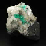 Beryl (variety emerald), Calcite, Dolomite, Pyrite<br />La Pita mining district, Polveros Mine, Municipio Maripí, Western Emerald Belt, Boyacá Department, Colombia<br />52x56x46mm, xls=10 & 5mm<br /> (Author: Fiebre Verde)