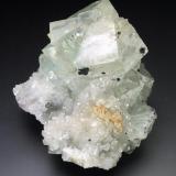 Fluorite on Quartz<br />Redburn Mine, Rookhope, Weardale, North Pennines Orefield, County Durham, England / United Kingdom<br />5x5x4 cm overall size<br /> (Author: Jesse Fisher)