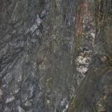 Scheelite is the buff-coloured material (Author: markbeckett)