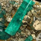 Beryl (variety emerald), Albite (variety cleavelandite), Pyrite<br />Chivor mining district, El Oriente Mine, Municipio Chivor, Eastern Emerald Belt, Boyacá Department, Colombia<br />110x54x20mm, largest xl=30mm<br /> (Author: Fiebre Verde)