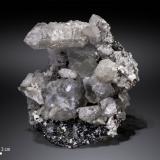 Quartz,Fluorite, Calcite and Magnetite<br />Huanggang Mines, Hexigten Banner (Kèshíkèténg Qí), Chifeng (Ulanhad), Inner Mongolia Autonomous Region, China<br />102x 102 mm<br /> (Author: Manuel Mesa)