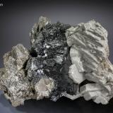 Ilvaite with Calcite<br />Huanggang Mines, Hexigten Banner (Kèshíkèténg Qí), Chifeng (Ulanhad), Inner Mongolia Autonomous Region, China<br />180 x 144 mm<br /> (Author: Manuel Mesa)