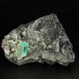 Beryl (variety emerald), Calcite, Pyrite<br />Muzo mining district, Western Emerald Belt, Boyacá Department, Colombia<br />90x45x58mm, main xl=16x11mm<br /> (Author: Fiebre Verde)