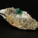 Beryl (variety emerald), Albite (variety cleavelandite), Calcite, Pyrite<br />Chivor mining district, Municipio Chivor, Eastern Emerald Belt, Boyacá Department, Colombia<br />51x18x21mm, xl=5mm<br /> (Author: Fiebre Verde)