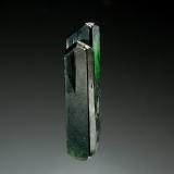 Diopside<br />Alchuri, Shigar District, Gilgit-Baltistan (Northern Areas), Pakistan<br />0.5 x 2.5 cm<br /> (Author: crosstimber)