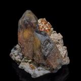 Quartz (variety smoky quartz), Spessartine<br />Wushan Spessartine prospects, Tongbei, Yunxiao, Zhangzhou Prefecture, Fujian Province, China<br />9.2 x 7.5 cm<br /> (Author: am mizunaka)