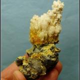 Fluorite, feldspar, hyalite opalErongo Mountain, Usakos, Erongo Region, Namibia92 x 72 x 48 mm (Author: Pierre Joubert)