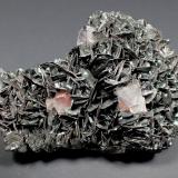 Hematite (variety specularite) on kidney ore, Quartz<br />Florence Mine, Egremont, West Cumberland Iron Field, former Cumberland, Cumbria, England / United Kingdom<br />52 mm x 33 mm x 18 mm<br /> (Author: Don Lum)