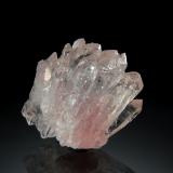 Quartz (variety rose quartz)<br />Pitorra claim, Alto da Pitorra, Laranjeiras, Galiléia, Vale do Rio Doce, Minas Gerais, Brazil<br />1.8 x 2.0 cm<br /> (Author: crosstimber)