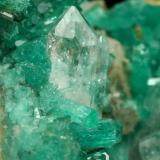 Beryl (variety emerald), Calcite, Quartz<br />Peñas Blancas Mine, Municipio San Pablo de Borbur, Western Emerald Belt, Boyacá Department, Colombia<br />43x30x34mm, aggregate with xls up to 10mm<br /> (Author: Fiebre Verde)