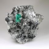 Beryl (variety emerald), Calcite, Pyrite<br />La Pita mining district, Polveros Mine, Municipio Maripí, Western Emerald Belt, Boyacá Department, Colombia<br />77x86x68mm, xl=19mm<br /> (Author: Fiebre Verde)