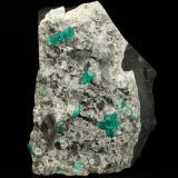 Beryl (variety emerald), Albite (variety cleavelandite), Dolomite, Pyrite<br />Chivor mining district, El Oriente Mine, Municipio Chivor, Eastern Emerald Belt, Boyacá Department, Colombia<br />94x73x49mm, main xls=15 & 13mm<br /> (Author: Fiebre Verde)