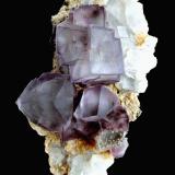 Fluorite, Quartz<br />Yaogangxian Mine, Yizhang, Chenzhou Prefecture, Hunan Province, China<br />Specimen size 12 cm, largest fluorite crystal 2,5 cm<br /> (Author: Tobi)