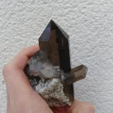 Quartz (variety smoky) with Hematite<br />Vorderes Galmihorn, Bächi Valley, Reckingen, Grafschaft, Goms, Wallis (Valais), Switzerland<br />8 cm<br /> (Author: Benj)