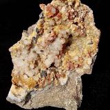 Sphalerite, Calcite and Dolomite with QuartzAfloramientos antigua Carretera Estatal 37, Bloomington (Norte), Condado Monroe, Indiana, USASpecimen is 12 cm. The sphalerite is up to 1 cm. The calcite is up to 1 cm. (Author: Bob Harman)