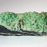 Beryl (variety emerald), Albite, Dolomite<br />Coscuez mining district, Calceteros Mine, Municipio San Pablo de Borbur, Western Emerald Belt, Boyacá Department, Colombia<br />9.9cm L x 2.4cm W x 3.5cm H<br /> (Author: Bergur_E_Sigurdarson)