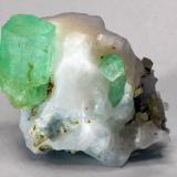 Beryl (variety emerald), Dolomite, Calcite<br />Muzo mining district, Western Emerald Belt, Boyacá Department, Colombia<br />W 3.4cm x H 2.5cm x D 2.1cm<br /> (Author: Bergur_E_Sigurdarson)