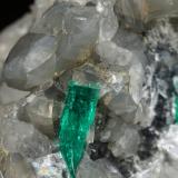 Beryl (variety emerald), Calcite, Dolomite<br />La Pita mining district, Cunas Mine, Municipio Maripí, Western Emerald Belt, Boyacá Department, Colombia<br />47x45x47mm, xl=18mm - 2 xls in the back: 11mm & 7mm<br /> (Author: Fiebre Verde)