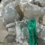 Beryl (variety emerald), Calcite, Dolomite<br />La Pita mining district, Cunas Mine, Municipio Maripí, Western Emerald Belt, Boyacá Department, Colombia<br />47x45x47mm, xl=18mm - 2 xls in the back: 11mm & 7mm<br /> (Author: Fiebre Verde)