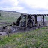 The restored Killhope waterwheel, which provided power to ore separation jigs in the adjacent building. (Author: Jesse Fisher)