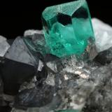 Beryl (variety emerald), Calcite, Pyrite, Quartz<br />Muzo mining district, Western Emerald Belt, Boyacá Department, Colombia<br />32x21x20mm, xls=7mm (main) & 17mm<br /> (Author: Fiebre Verde)