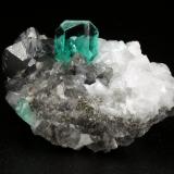 Beryl (variety emerald), Calcite, Pyrite, Quartz<br />Muzo mining district, Western Emerald Belt, Boyacá Department, Colombia<br />32x21x20mm, xls=7mm (main) & 17mm<br /> (Author: Fiebre Verde)