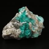 Beryl (variety emerald), Calcite, Pyrite<br />Chivor mining district, Municipio Chivor, Eastern Emerald Belt, Boyacá Department, Colombia<br />38x25x29mm, xls=up to 10mm<br /> (Author: Fiebre Verde)