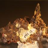 Copper<br />Ray Mines, Scott Mountain area, Mineral Creek District, Dripping Spring Mountains, Pinal County, Arizona, USA<br />Overall size: 46mm x 49mm x 16mm. Crystal size: 24mm x 6mm x 3mm. Weight: 57 g.<br /> (Author: franjungle)