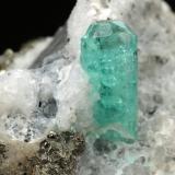 Beryl (variety emerald), Calcite, Pyrite<br />Chivor mining district, Municipio Chivor, Eastern Emerald Belt, Boyacá Department, Colombia<br />30x28x17mm, xl=10mm<br /> (Author: Fiebre Verde)