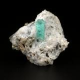 Beryl (variety emerald), Calcite, PyriteChivor (distrito minero), Municipio Chivor, Cinturón Esmeraldífero Oriental, Departamento Boyacá, Colombia30x28x17mm, xl=10mm (Author: Fiebre Verde)