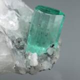 Beryl (variety emerald), Calcite<br />Coscuez mining district, Municipio San Pablo de Borbur, Western Emerald Belt, Boyacá Department, Colombia<br />42x20x18mm, xl=9mm<br /> (Author: Fiebre Verde)