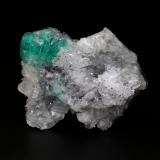 Beryl (variety emerald), Calcite<br />Coscuez mining district, Municipio San Pablo de Borbur, Western Emerald Belt, Boyacá Department, Colombia<br />40x35x16mm, aggregate=10x15mm<br /> (Author: Fiebre Verde)