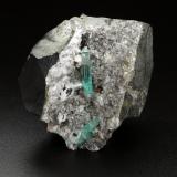 Beryl (variety emerald), Calcite, Pyrite<br />Chivor mining district, Palo Arañado Mine, Municipio Chivor, Eastern Emerald Belt, Boyacá Department, Colombia<br />51x49x46mm, main xl=20mm<br /> (Author: Fiebre Verde)