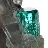 Beryl (variety emerald), Calcite<br />La Pita mining district, Cunas Mine, Municipio Maripí, Western Emerald Belt, Boyacá Department, Colombia<br />33x26x18mm (calcite xl), xls=8.5 & 4mm<br /> (Author: Fiebre Verde)