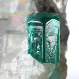 Beryl (variety emerald), Calcite<br />La Pita mining district, Cunas Mine, Municipio Maripí, Western Emerald Belt, Boyacá Department, Colombia<br />33x26x18mm (calcite xl), xls=8.5 & 4mm<br /> (Author: Fiebre Verde)