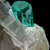 Beryl (variety emerald), Calcite<br />La Pita mining district, Cunas Mine, Municipio Maripí, Western Emerald Belt, Boyacá Department, Colombia<br />33x26x18mm (calcite xl), xls=8.5 & 4mm<br /> (Author: Fiebre Verde)