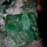 Berilo (variedad esmeralda).Coscuez (distrito minero), Mina La Paz, Municipio San Pablo de Borbur, Cinturón Esmeraldífero Occidental, Departamento Boyacá, Colombia0´896 x 0´813 mm. (Autor: Jesus Franquesa Baucells)
