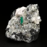 Beryl (variety emerald), Calcite, Dolomite, Pyrite<br />Coscuez mining district, Municipio San Pablo de Borbur, Western Emerald Belt, Boyacá Department, Colombia<br />46x68x26mm, xl=11mm<br /> (Author: Fiebre Verde)