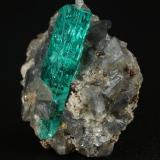 Beryl (variety emerald), Calcite, Pyrite<br />Chivor mining district, Municipio Chivor, Eastern Emerald Belt, Boyacá Department, Colombia<br />20x20x13mm, xl=20mm<br /> (Author: Fiebre Verde)