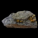 WulfenitaMina El Centenillo, Cortijo del Humo, Cerro de las Minas, Albuñuelas, Comarca Valle de Lecrín, Granada, Andalucía, España9x4x3 cm. (Autor: Nacho)
