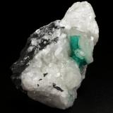 Beryl (variety emerald), Calcite<br />Muzo mining district, Western Emerald Belt, Boyacá Department, Colombia<br />45x47x32mm, xl=15mm<br /> (Author: Fiebre Verde)