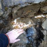 The remnants of the largest vug I&rsquo;ve found at the locality. Came out incredibly clean as no outside dirt seemed to have managed to get in. 
It was nearly all Stilbite, but very unusal for this area as it has parts that show very pretty pink hues!
What is in the picture still sits in the cliff wall as I didn&rsquo;t have tools to get any further in without smashing everything into pieces. (Author: Bergur_E_Sigurdarson)