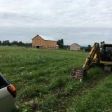 Looking toward the location of the  latest quartz find. First indications were to the right of the house, that’s were the water line terminated. We assume that this area could produce much quartz, but, we must be surgical in our work because of the location relative to the house and barn. (Author: vic rzonca)