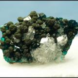 Calcite, Mottramite, Dioptase<br />Tsumeb Mine, Tsumeb, Otjikoto Region, Namibia<br />30 x 22 x 10 mm<br /> (Author: Pierre Joubert)